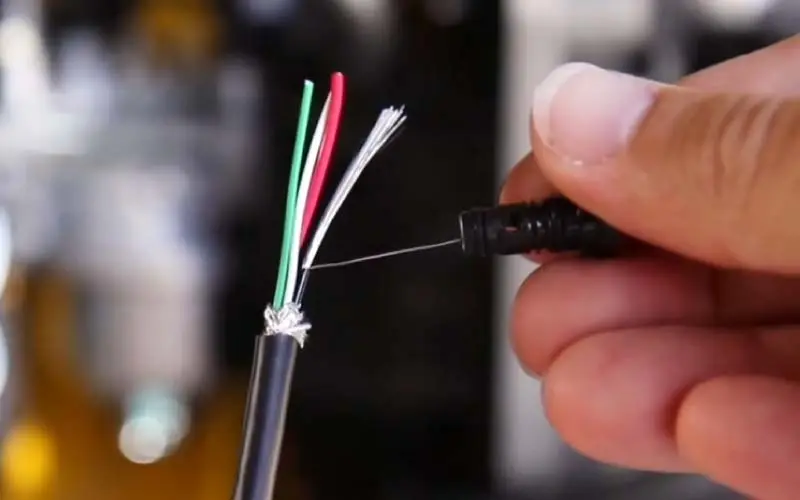 use one thread of copper wire to clean the jet